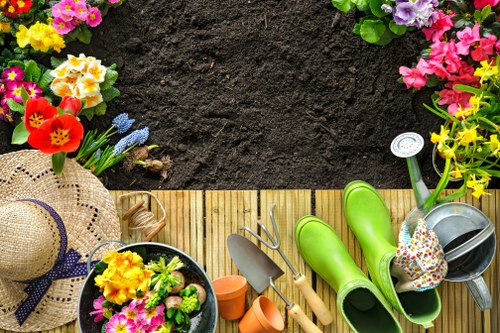 Gardener testing soil in Hampstead garden